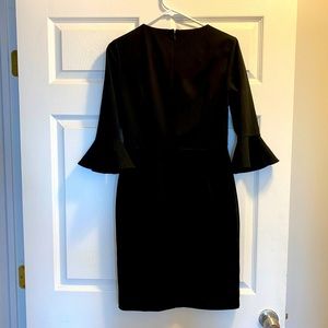 Classic black dress peplum sleeves